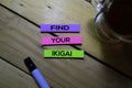 Find Your Ikigai text on sticky notes isolated on Table background. Japanese concept