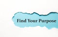 Find your purpose appearing behind torn brown paper Royalty Free Stock Photo
