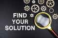 Find Your Solution text message with magnifying glass on black background Royalty Free Stock Photo