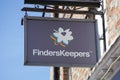 The Finders Keepers sign hanging from a wall in the UK