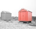 Findhorn, Scotland - July 2016: Colourful beach huts along the coast at Findhorn Bay in Northern Scotland among the sand dunes Royalty Free Stock Photo