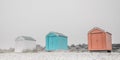 Findhorn, Scotland - July 2016: Colourful beach huts along the coast at Findhorn Bay in Northern Scotland among the sand dunes Royalty Free Stock Photo