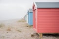 Findhorn, Scotland - July 2016: Colourful beach huts along the coast at Findhorn Bay in Northern Scotland among the sand dunes Royalty Free Stock Photo