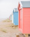 Findhorn, Scotland - July 2016: Colourful beach huts along the coast at Findhorn Bay in Northern Scotland Royalty Free Stock Photo