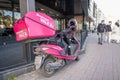 Findikli, Istanbul, Turkey - 02.26.2021: parked motorcycle of Yemek Sepeti company literally Food Basket in Turkish Royalty Free Stock Photo