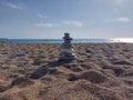 Finding peace and calmness on the beach with lots of stones