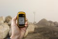 Finding the right position inside a construction site via gps blurred background Royalty Free Stock Photo