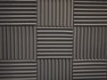 Acoustical foam or tiles for sound dampening. Music room. Soundproof room. Low key photo. Royalty Free Stock Photo