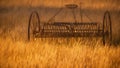 Fine art, artwork. Digital abstract oil painting of an antique hay rake in a farmers field at sunset Royalty Free Stock Photo