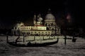 Fine art retro image with gondola on Canal Grande at night with wood planks floor for foreground, full moon and milky, Venice, It Royalty Free Stock Photo