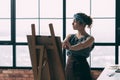 Fine art school young lady learning paint easel Royalty Free Stock Photo