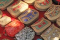 Fine beautiful small handbags mosaic are sold on the market in India. Gift souvenir India Tibet Bazaar