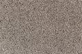 Fine brown pebbles textured wall