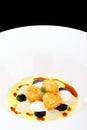 Fine dining, deep fried scallops with olive oil, cheese Royalty Free Stock Photo