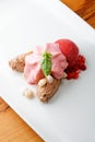 Fine dining dessert, chocolate mousse and strawberry ice cream Royalty Free Stock Photo