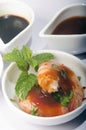 A Fine Dining Dish of Prawns in chili Sauce. in White bowl. Asian kitchen Royalty Free Stock Photo