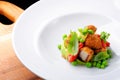 Fine dining, Fried Octopus on basil mousse, green peas Royalty Free Stock Photo