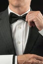 Fine Dining Waiter Adjusitg Bowtie Royalty Free Stock Photo