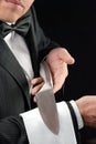 Fine Dining Waiter Presenting Knife Royalty Free Stock Photo