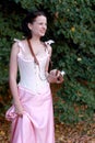 Fine emotional brunette with vintage photo camera.