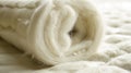 A roll of fiberglass insulation lies coiled, its fluffy texture reminiscent of cotton candy, AI generated