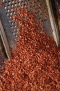 Fine grated chocolate on grater Royalty Free Stock Photo
