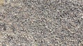Fine gravel texture or gravel background for the design. Sea or river pebbles. Fine stone for building and mixing concrete Royalty Free Stock Photo