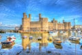 Caernarfon castle Wales with boats colourful hdr