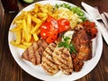 Fine Meat - Classic Greek Meat Plate with French Fries Royalty Free Stock Photo