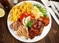 Fine Meat - Classic Greek Meat Plate with French Fries Royalty Free Stock Photo