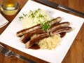Fine Meat - German Sausages with Sauerkraut and mashed Potatoes Royalty Free Stock Photo