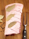 Fine Meat - Pork Suckling Loin - Prepared Pork Meat on a Kitchen Board Royalty Free Stock Photo