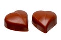 Fine milk chocolate chocolates in the shape of a heart isolated on a white background. Macro