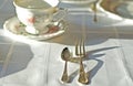 Fine porcelaine cup and silver cutlery on table