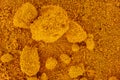 Fine powder - Methyl yellow organic compound - under microscope, image width 9mm. Abstract science background