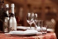 Fine restaurant dinner table place setting indoor. Royalty Free Stock Photo