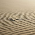 Fine sand with evenly spaced ridges, likely wind-formed, creates a pattern of parallel Royalty Free Stock Photo