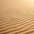 Fine sand patterns with a series of parallel ridges and grooves create a visually Royalty Free Stock Photo