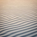 Fine sand ripples create a mesmerizing Royalty Free Stock Photo