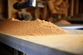 fine sawdust settled on a carpenters workbench Royalty Free Stock Photo