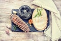 Fine selection of French cheese and sausages on stone plate. Foo Royalty Free Stock Photo