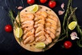 Fine selection of jumbo shrimps for dinner on stone plate Royalty Free Stock Photo