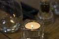 Fine table setting in gourmet restaurant. Salt, pepper shaker and candle Royalty Free Stock Photo