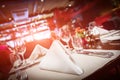 Fine table setting with red light flare Royalty Free Stock Photo