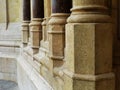 Beige stone and dark marble base & columns of church entrance in Zagreb Royalty Free Stock Photo