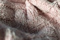 Fine textured and voluminous fabric in pink. Embossed textile pattern, pleasant to the touch and delicate, velvety