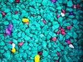 Fine turquoise pebbles. The background consists of small turquoise pebbles. With many possible uses. The texture consists of tiny