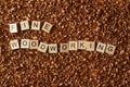 Fine woodworking word writen with letters on a wood chips Royalty Free Stock Photo