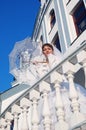 The fine young bride with an umbrella