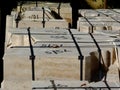 Packaged white porous building stones in bright sunlight